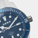 AERA D-1 Ocean blue dial and crown detail with Swiss Super-LumiNova hands
